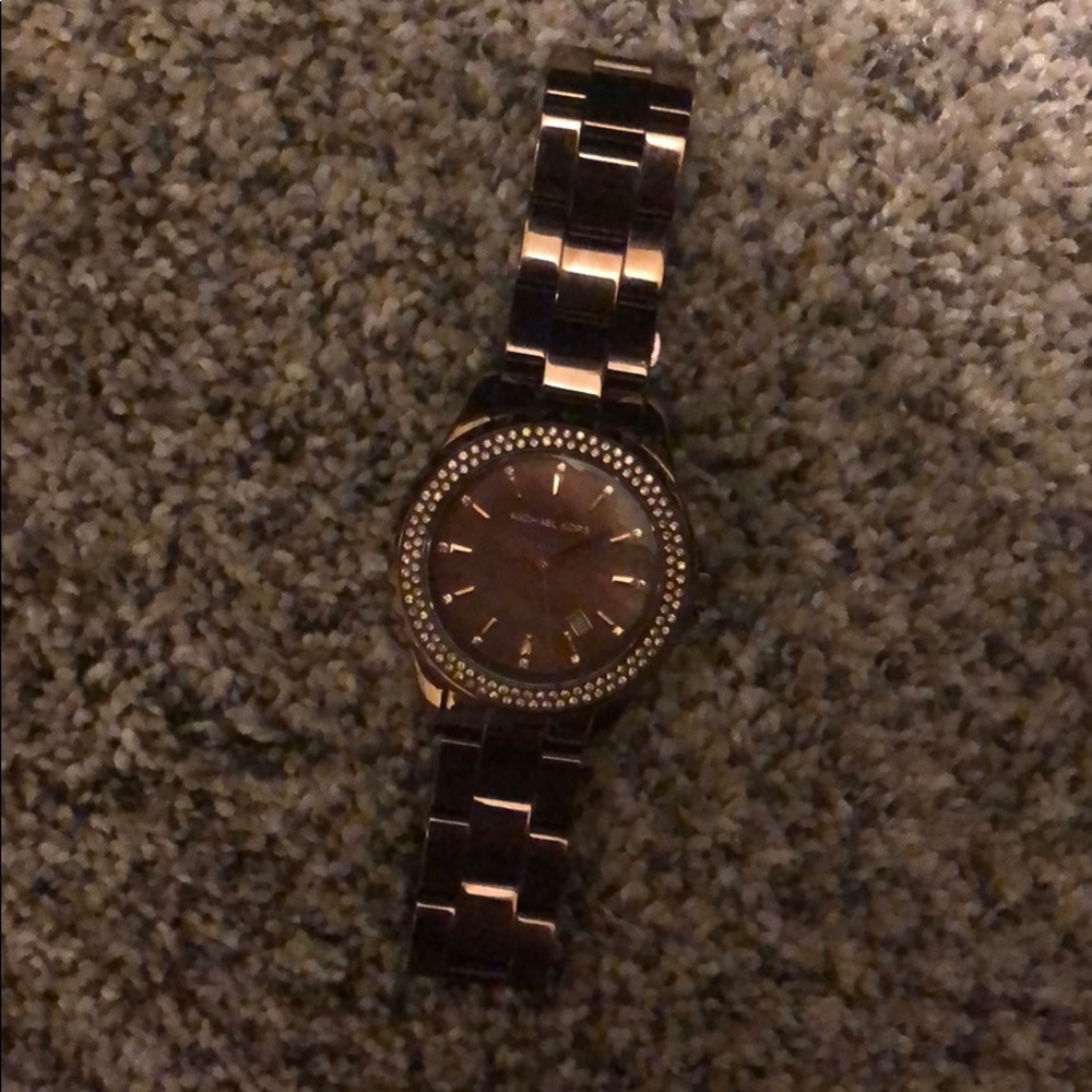 Woman’s chocolate Michael kors watch